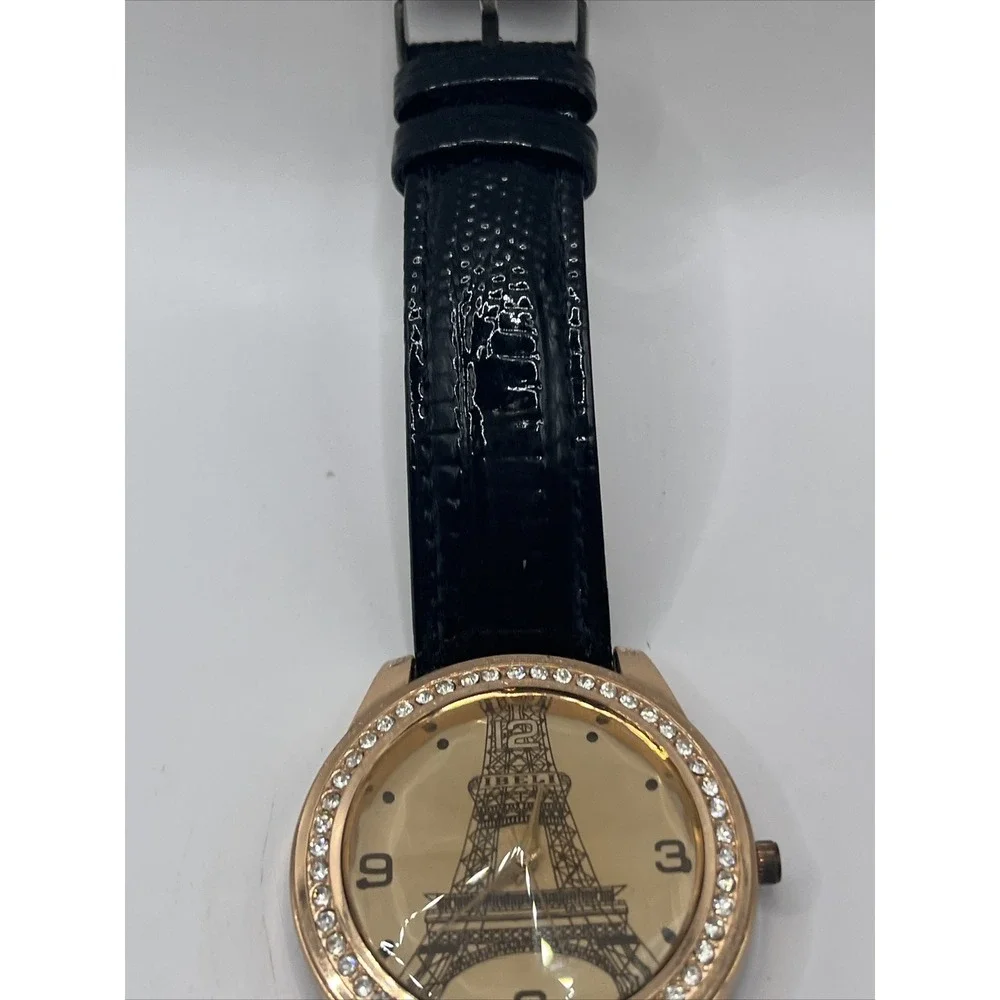 IBELI Women's Watch Eifel Tower Black Leather Band Rhinestone Bezel- New Battery